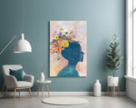 Woman Portrait glass wall art styled above a bed in a gentle-mood bedroom