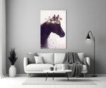 Close-up detail of the white and gold flower crown on the horse silhouette