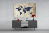 World Map panel catching soft light to reveal its parchment grain