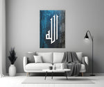 Close-up detail of the white Kufic letterforms on weathered teal