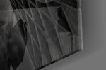 Interesting Architectural artwork anchoring a modernist-themed wall in moody palette