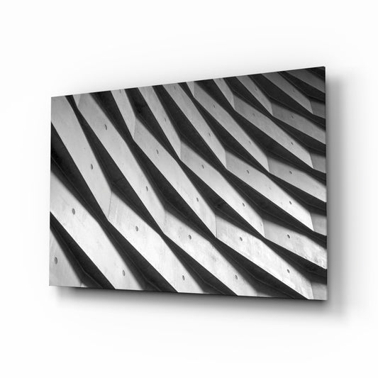Architectural Walls glass wall art displayed above a console in a designer interior