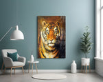 Tiger glass wall art styled above a sofa in a sienna-palette living room