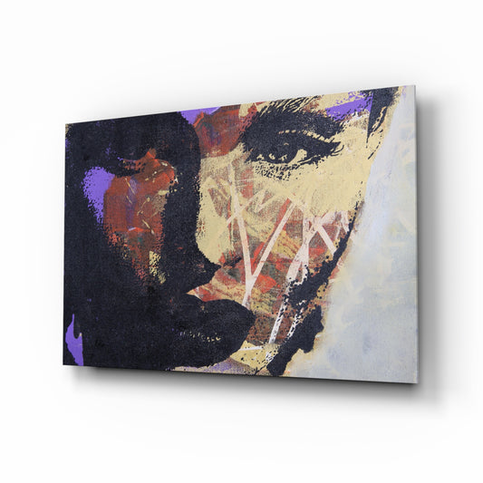 Women's glass wall art displayed above a console in a designer interior