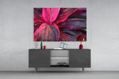 Leaf panel catching warm light to reveal its dimensional folds