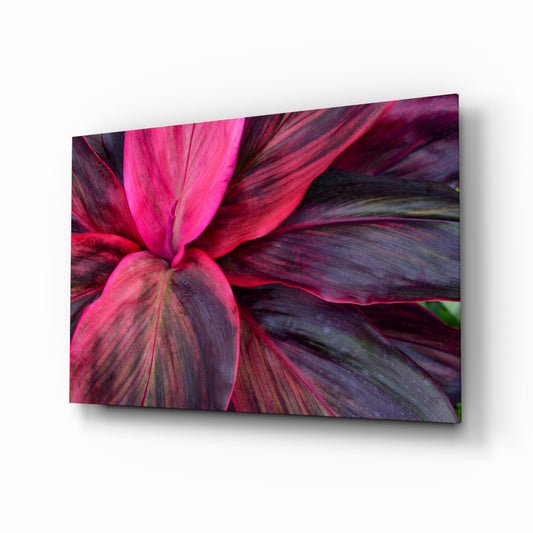 Leaf glass wall art displayed above a console in a designer interior
