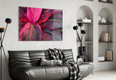 Leaf glass wall art styled above a bed in an intimate bedroom