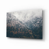Forest glass wall art displayed above a console in a designer interior
