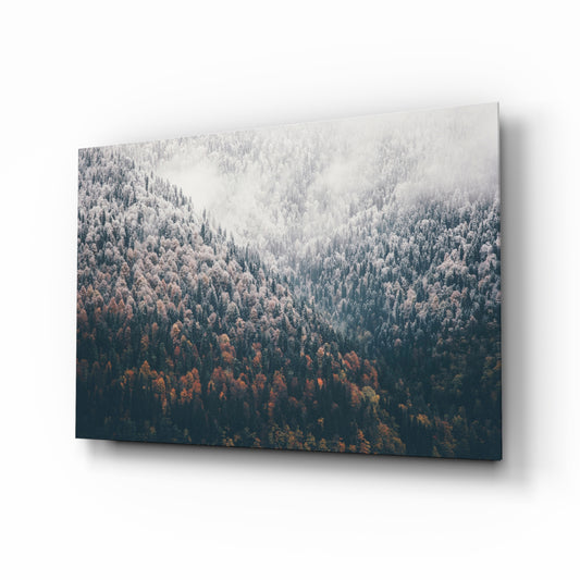 Forest glass wall art displayed above a console in a designer interior
