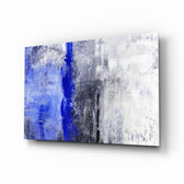 Abstract glass wall art displayed above a console in a designer interior