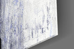 Abstract artwork anchoring a contemporary wall in moody palette