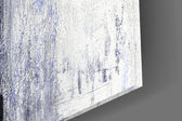 Abstract artwork anchoring a contemporary wall in moody palette