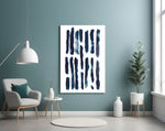 Lines glass wall art styled above a desk in a reflective study