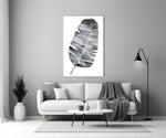 Close-up detail of striped banana leaf in soft monochrome wash