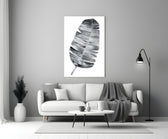 Close-up detail of striped banana leaf in soft monochrome wash