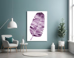 Leaf glass wall art styled above a bed in an intimate bedroom