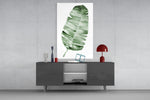 Feather panel catching soft light to reveal its watercolor wash