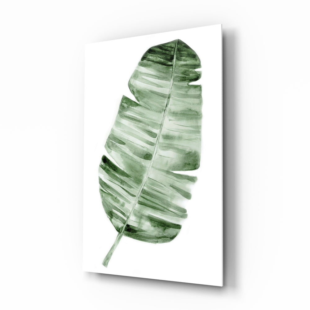 Feather glass wall art displayed above a console in a designer interior