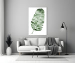 Close-up detail of striped banana leaf in soft jade watercolor wash