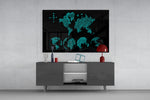 Continents panel catching low light to reveal its sketched globes