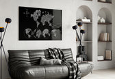 Continents glass wall art styled in an executive office