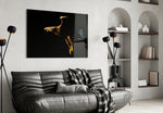 Eagle glass wall art styled above a desk in an executive-presence study