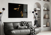 Eagle glass wall art styled above a desk in an executive-presence study