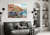 Ships glass wall art styled above a sofa in a Mediterranean-mood living room