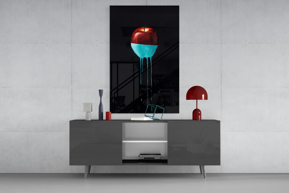 Apple panel catching gallery light to reveal its dripping ribbons