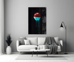 Close-up detail of crimson apple submerged in glossy turquoise paint