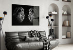 Lion glass wall art styled above a desk in an executive-presence study