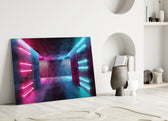 Close-up detail of magenta-and-cyan neon strips on raw concrete walls