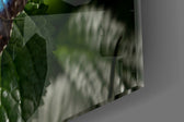 Butterfly artwork anchoring a wall with biophilic palette