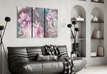 Flowers glass wall art styled above a bed in a serene bedroom