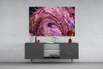 Colors panel catching gallery light to reveal its glittering veining