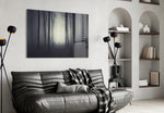 Foggy Forest glass wall art styled above a desk in an introspective study