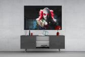 Clown panel catching low light to reveal its smoke-shrouded theater