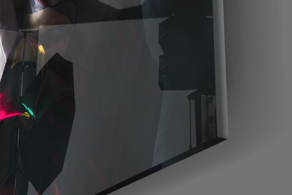 Clown artwork anchoring a wall with bold edgy palette