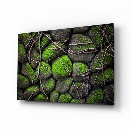 Mossy Stones glass wall art displayed above a console in a designer interior