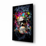 Skull glass wall art displayed above a console in a designer interior