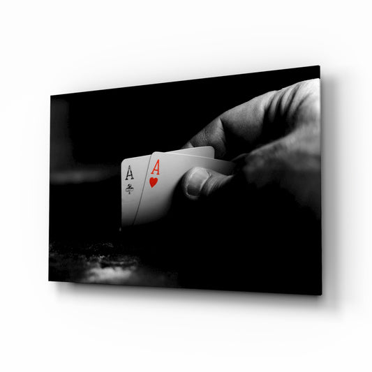Playing Cards glass wall art displayed above a console in a designer interior