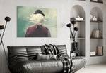 Cloud Man glass wall art styled above a desk in an introspective study
