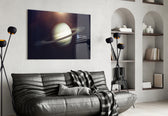 Saturn glass wall art styled above a desk in a cosmic child's room