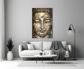 Close-up detail of bronze Buddha face with gilded bamboo-leaf strands