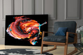 Dance of Red glass print enhancing a media room with theatrical pulse