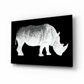 Rhino glass wall art displayed above a console in a designer interior