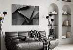 Cold Wall glass wall art styled above a desk in an editorial study