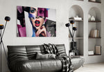 Women's glass wall art styled above a vanity in a powder room