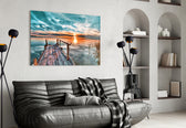 Sunset glass wall art styled above a desk in a traveler's-mood study