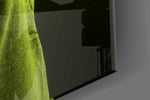 Green Lion Head artwork anchoring a wall with moody conceptual palette